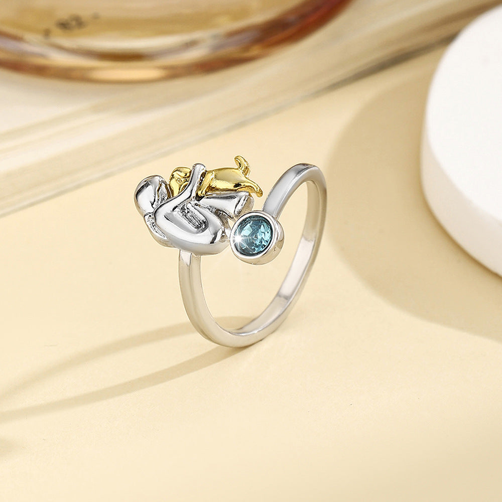 A little girl and a dog embrace earrings